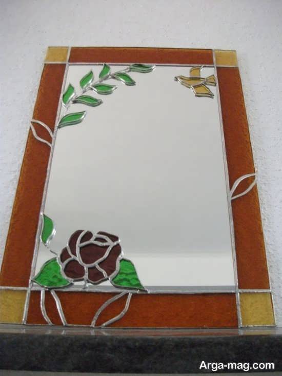 نقش برجسته گل روی آینه