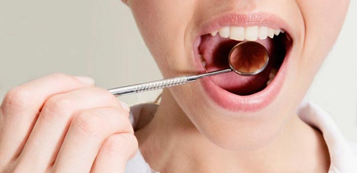 علائم سرطان دهان چیست و نحوه‌ی تشخیص آن چگونه است؟