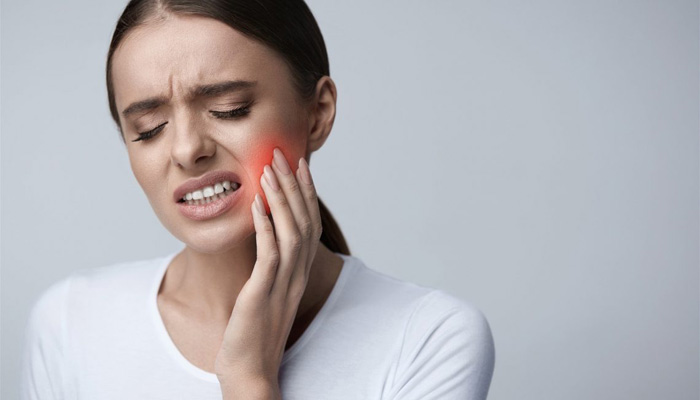 علت درد ریشه دندان چیست و چگونه درمان می‌شود؟
